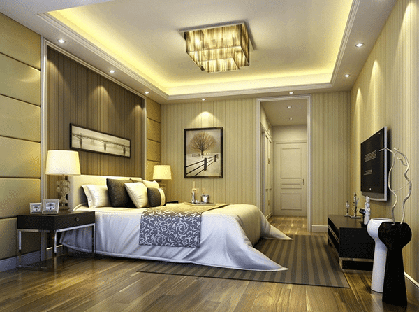 Phòng ngủ hiện đại với ánh sáng ấm áp, giường rộng và trang trí tinh tế, tạo cảm giác thoải mái và sang trọng.